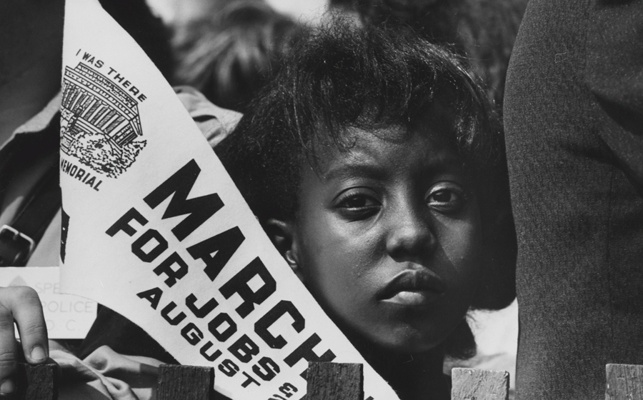 Photograph of a Young Woman (Edith Lee-Payne) at the Civil Rights March on Washington, DC, with a Banner